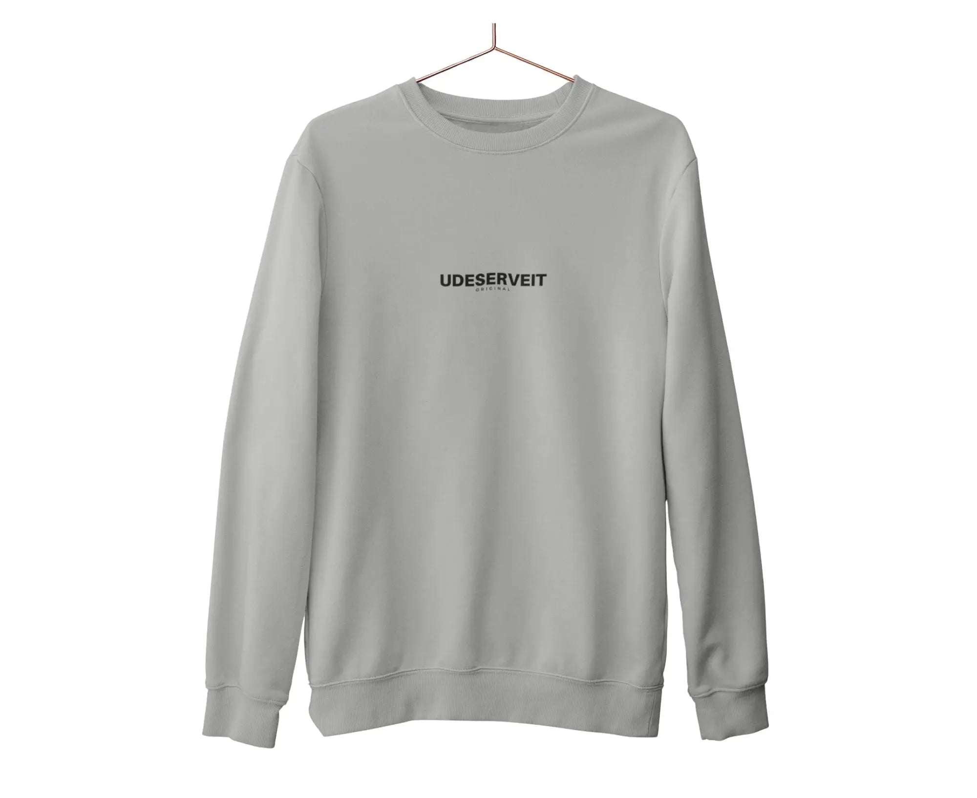 Gray sweatshirt with 'UDESERVEIT' text on a hanger against a white background