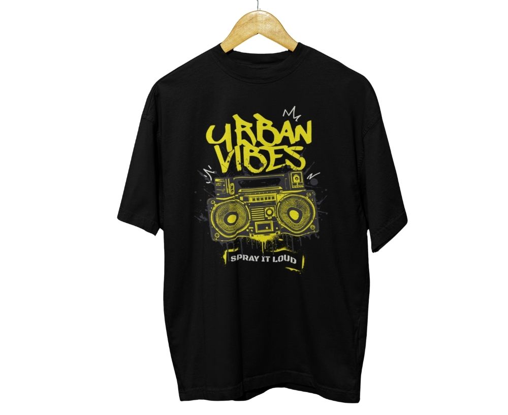 Black t-shirt with yellow graphic and text 'My Urban Vibes Spray It Loud' on a white background.